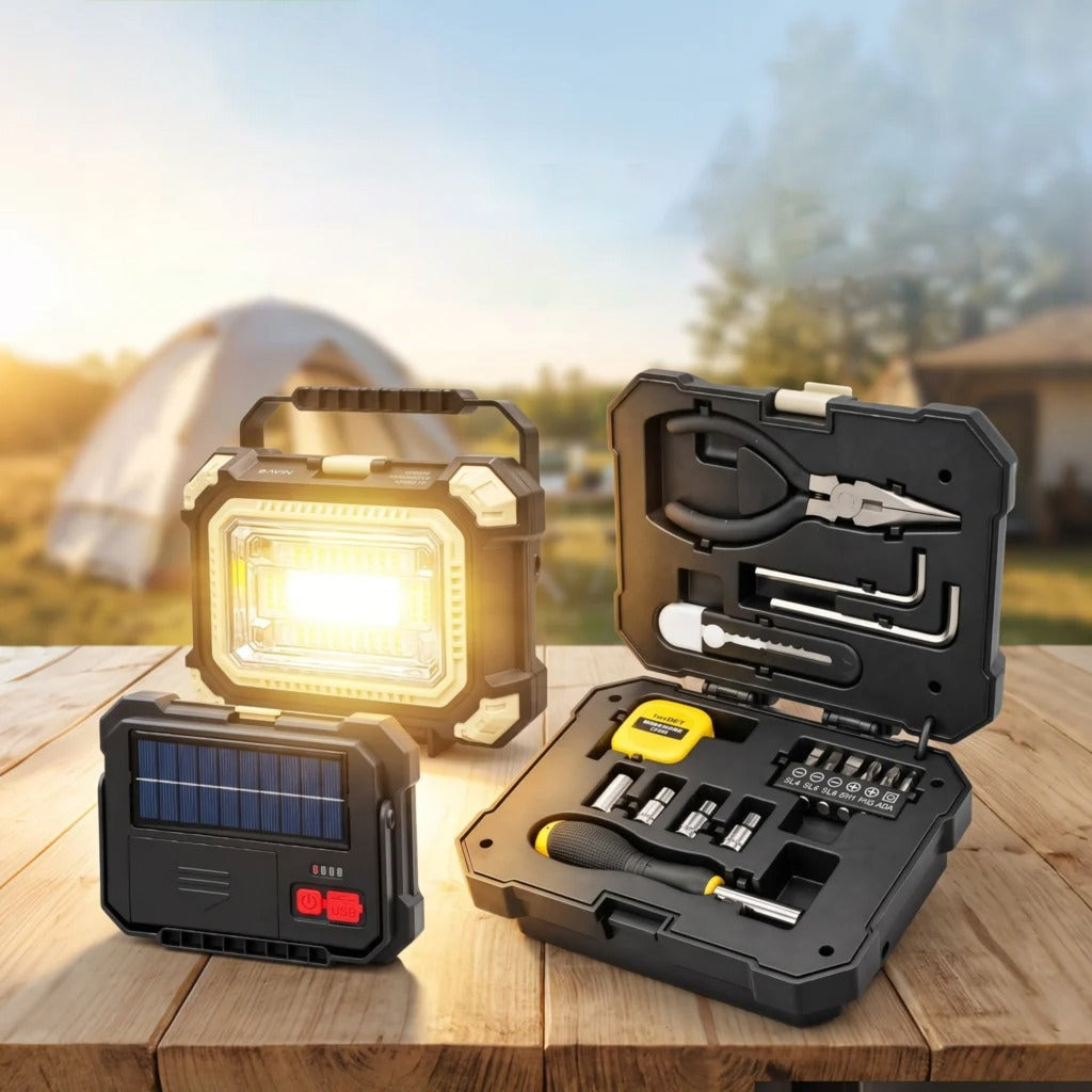 Solar Rechargeable LED Camping Light with Portable Tool Kit Placed in a Camping Area.