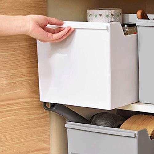 Placing a Large Capacity Cabinet Organizing Storage Box onto the shelf