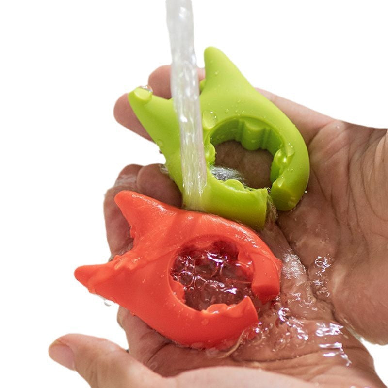 A Person is Cleaning Spoon Rest Of Different Colors.