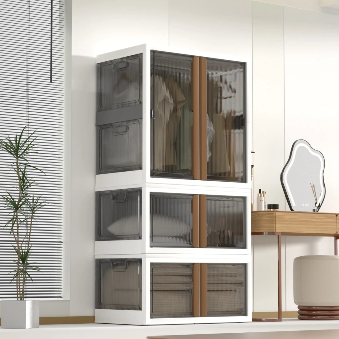 A Stackable Storage Bin is Kept On the Side Of Bedroom with Clothes.