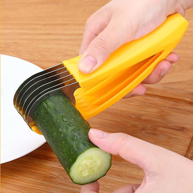 Someone cutting a cucumber with the help of a Stainless Steel Banana Cutter Slicer