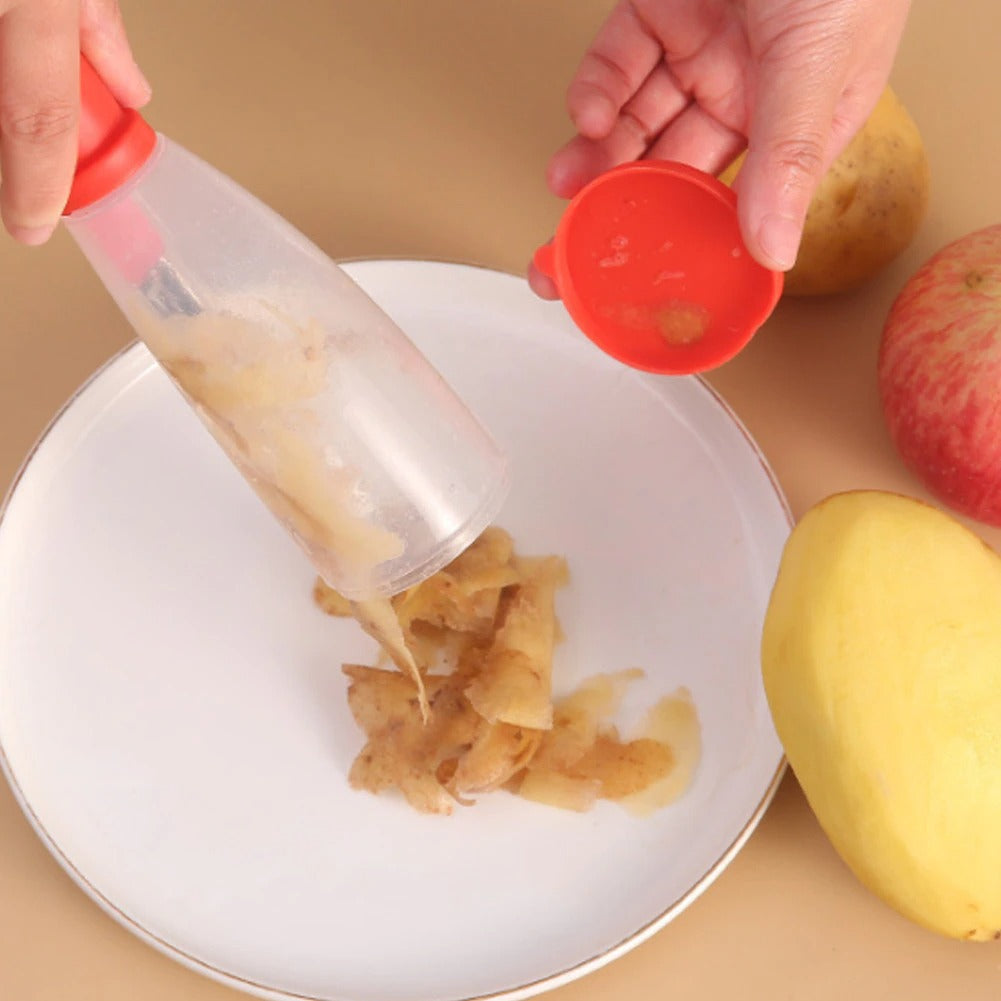 A  Person Removes Skin of Potato From Container of Peeler.