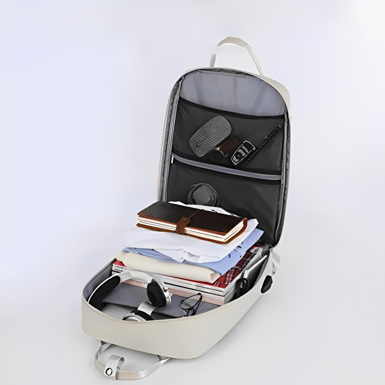 Stylish  Laptop Backpack with USB Charging With Multiple Items are Organized in it.