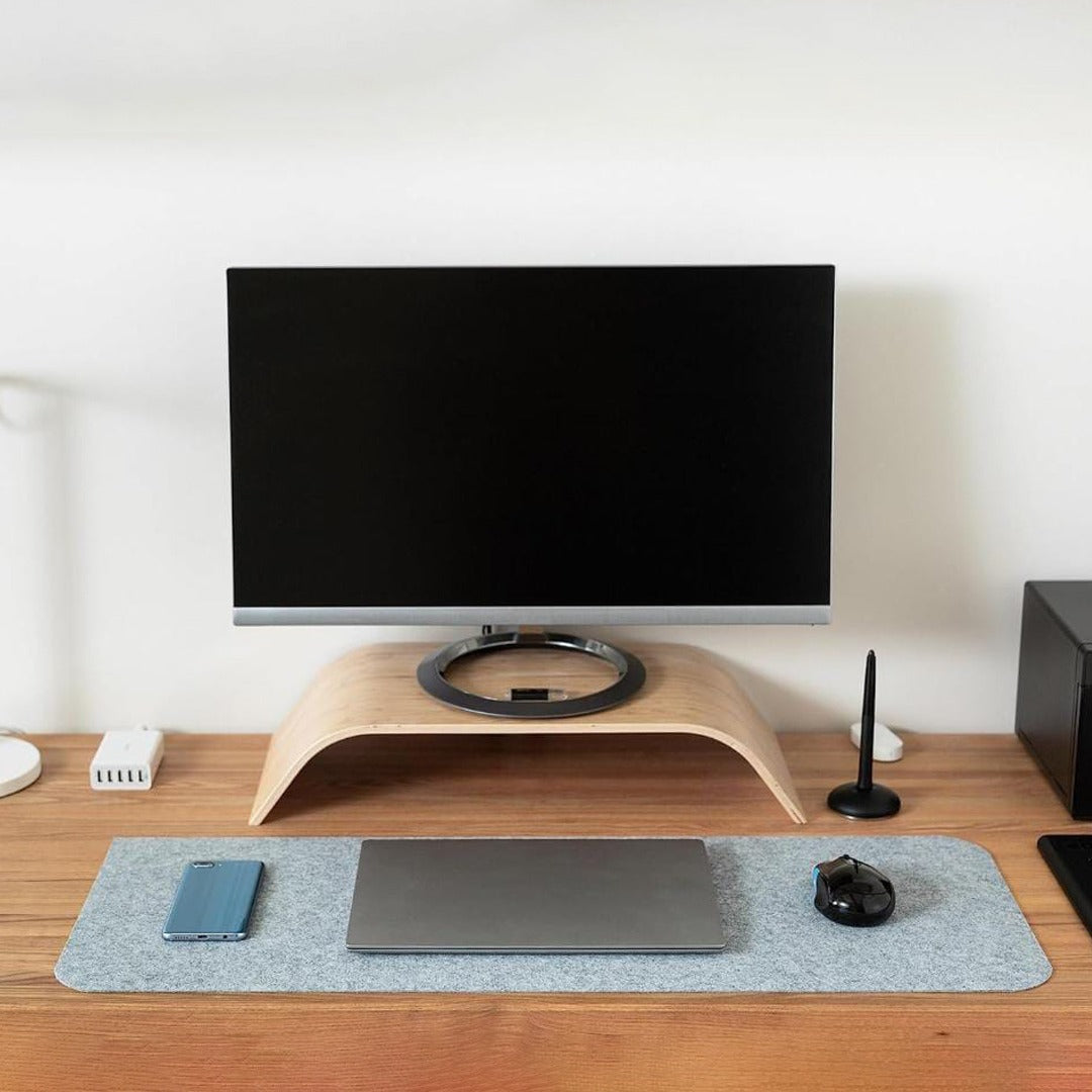 Table Mouse Pad in Light Grey Color Were Laptop and Mouse are Placed.