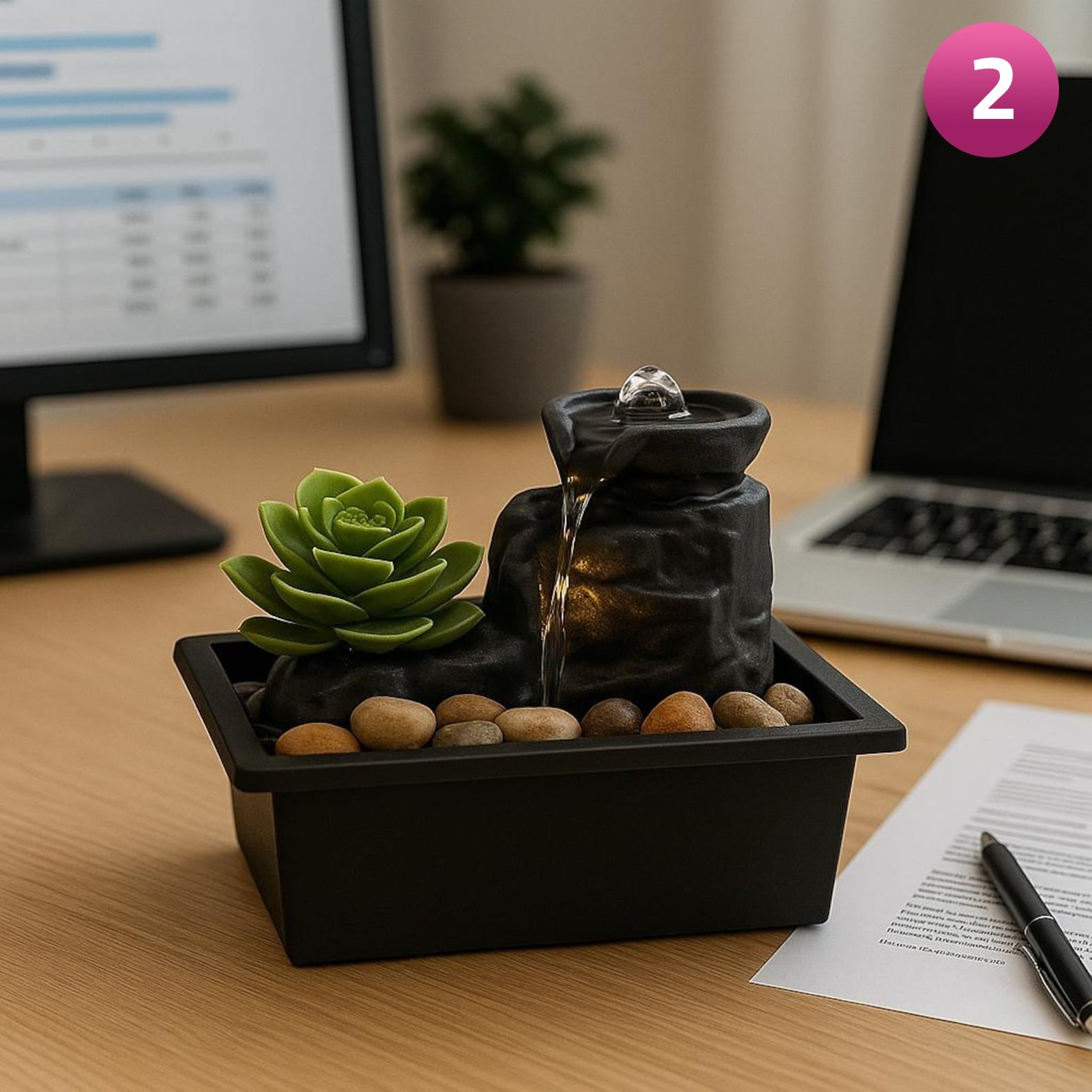 A Tabletop Water Fountain with Natural Stone is Kept in a Table.