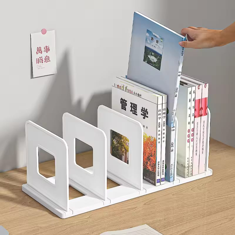 A Person is Taking Book From a Desktop Book Organizer Shelf Stand.