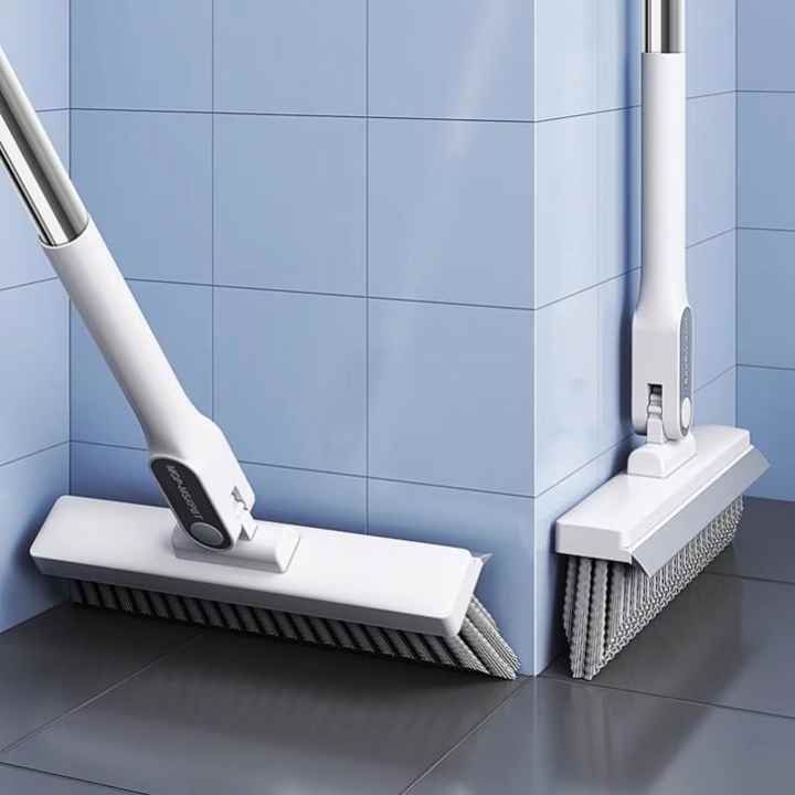 Toilet Floor Wiper Brush is Placed On the Side Of Bathroom.