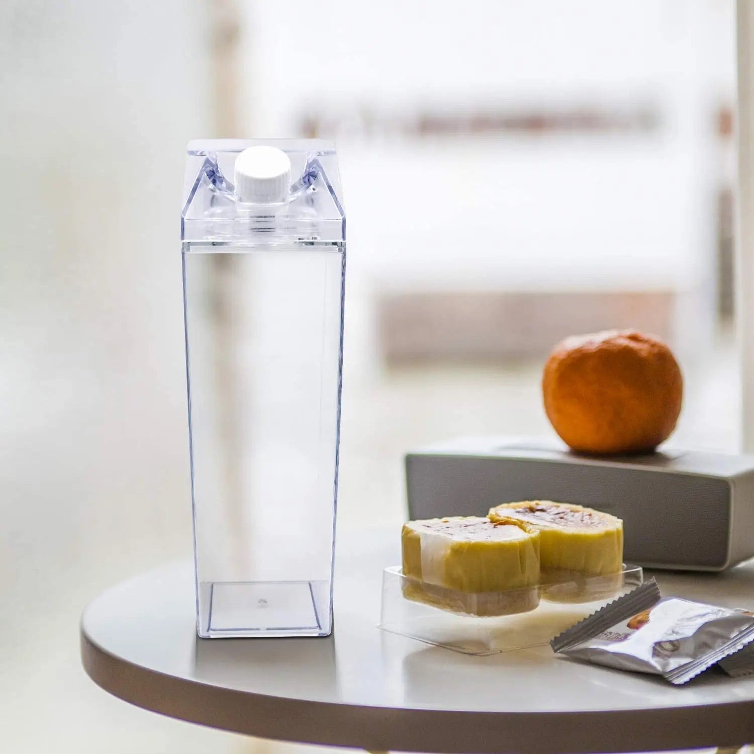 Transparent Plastic Juice Bottle Is Placed in a Table.