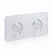 A clear acrylic wall hook panel with two transparent  hooks on a white background.