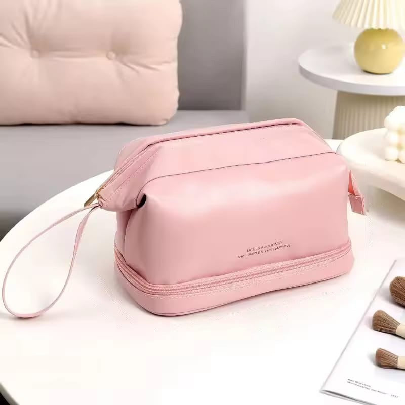 A Pink Travel Cosmetic Makeup Organizer Bag.