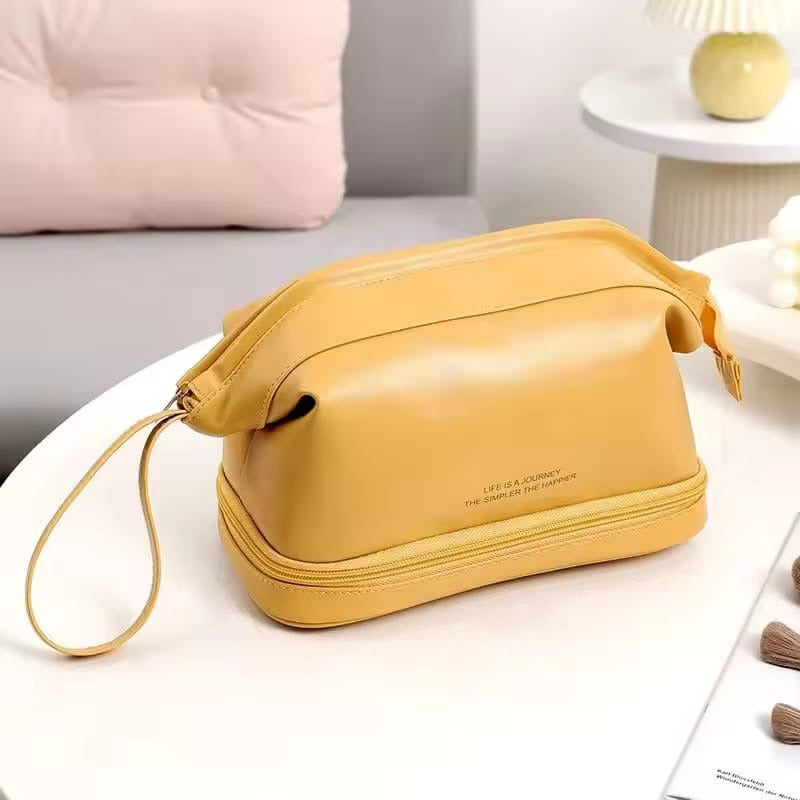 A Yellow Travel Cosmetic Makeup Organizer Bag.