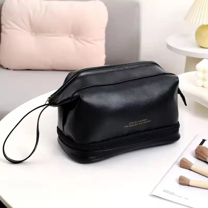 A Black Travel Cosmetic Makeup Organizer Bag.