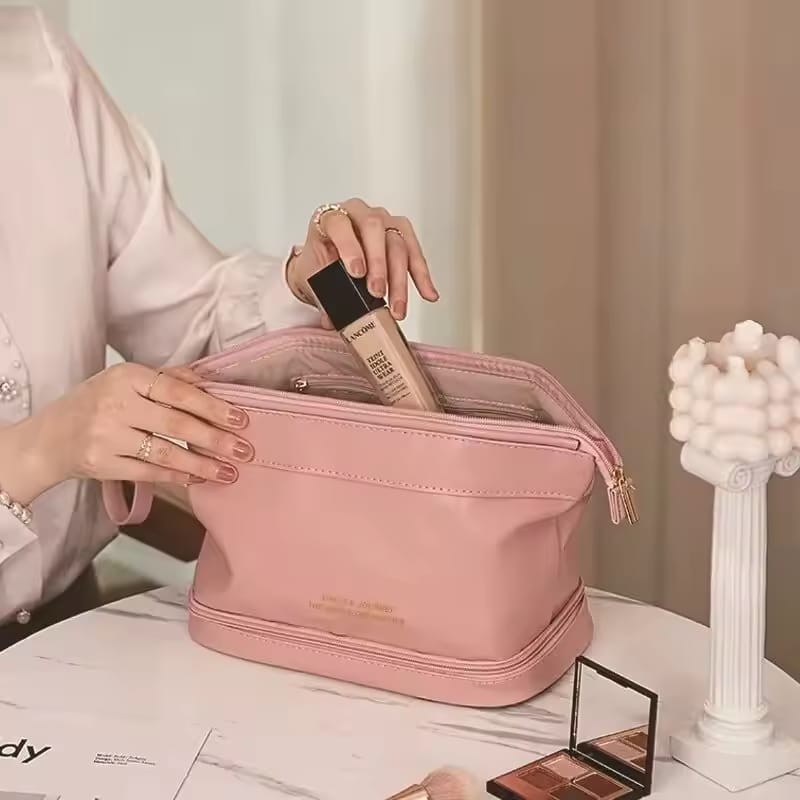 A Woman is Keeping Her Makeup Item in to Travel Cosmetic Makeup Organizer Bag.