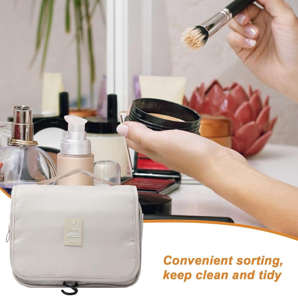 A Person is Using Travel Toiletry Storage Bag to Keep Her Toiletry Items.