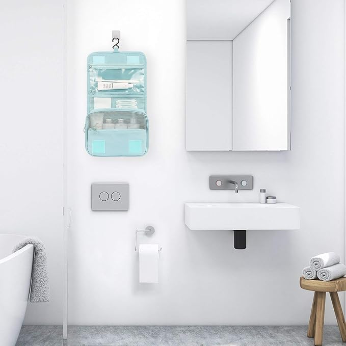 A Travel Toiletry Storage Bag Is Hanged On the Wall of Bathroom.