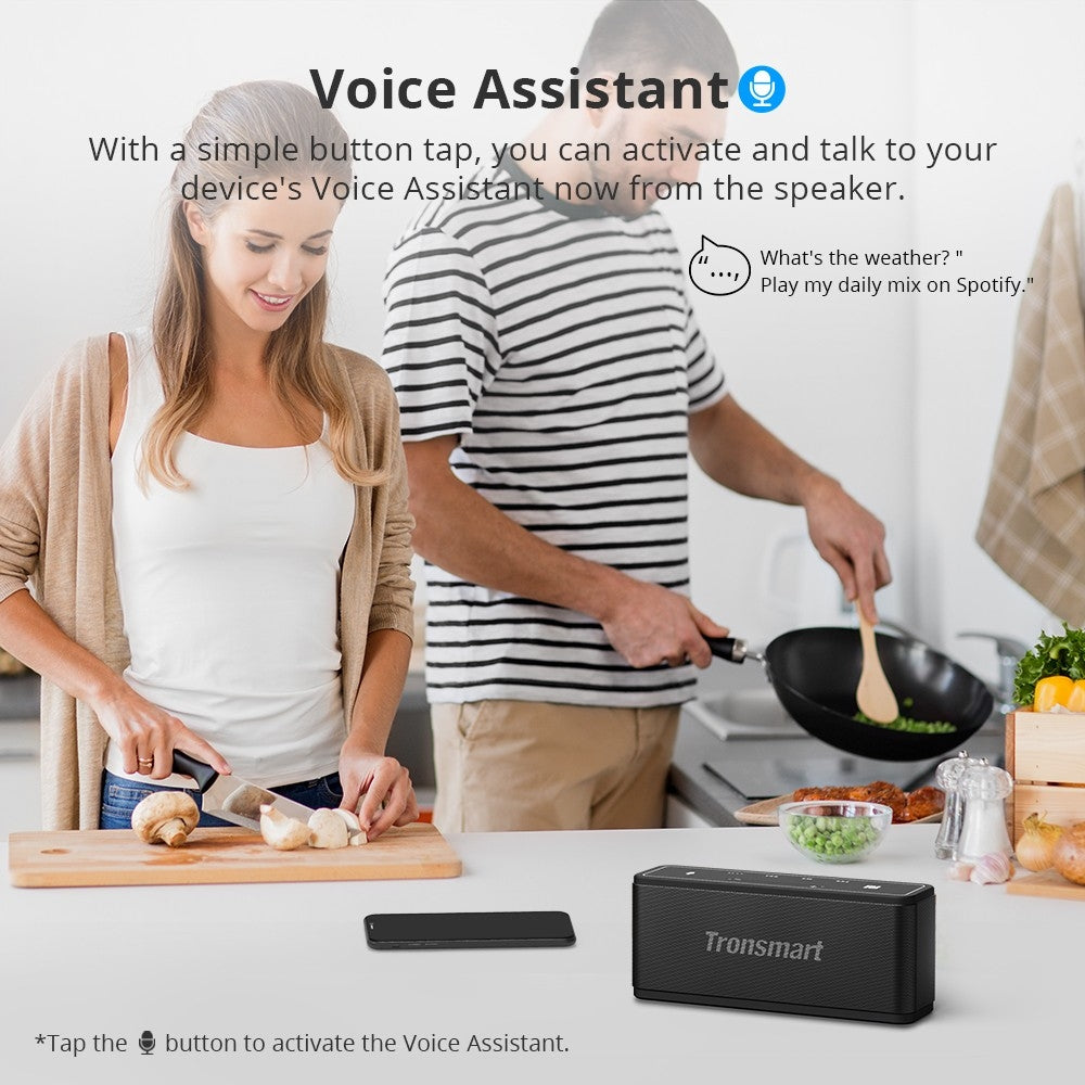 A Couple is Enjoying Their Cooking By Playing Tronsmart Element Mega SoundPulse® Wireless Speaker.