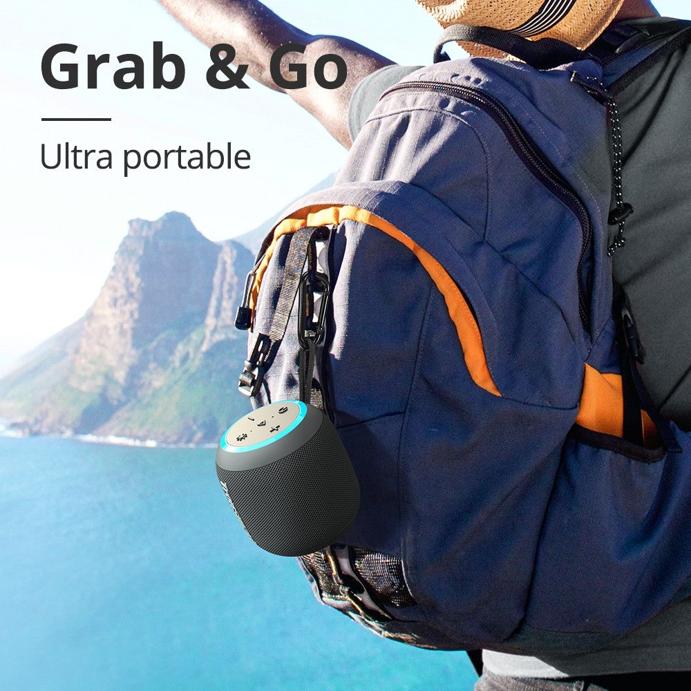 A Person is Carrying a Tronsmart T7 Mini Outdoor Speaker While Travelling.