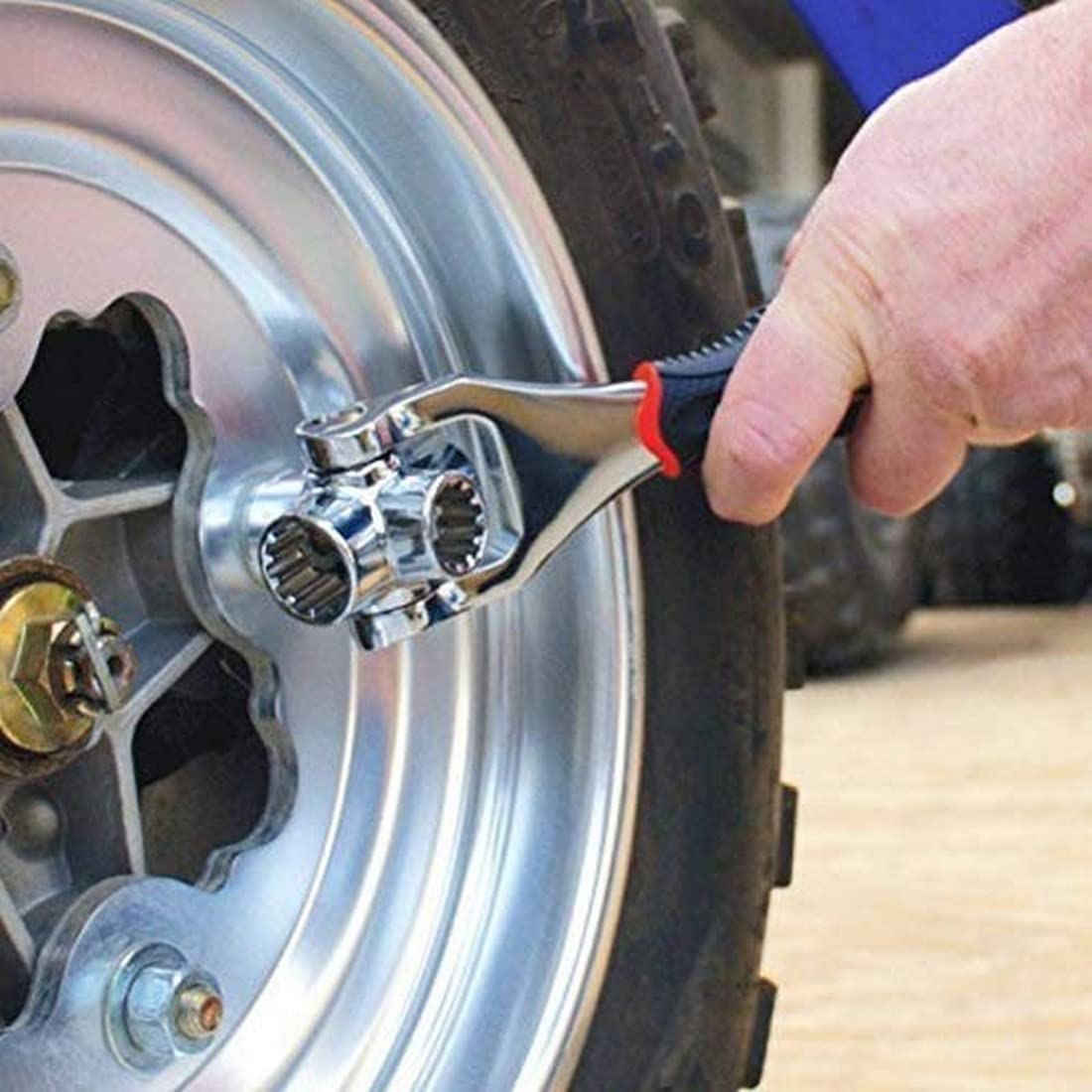 Someone is Using 48-in-1 Multi-Socket Wrench to Fix Tyre.