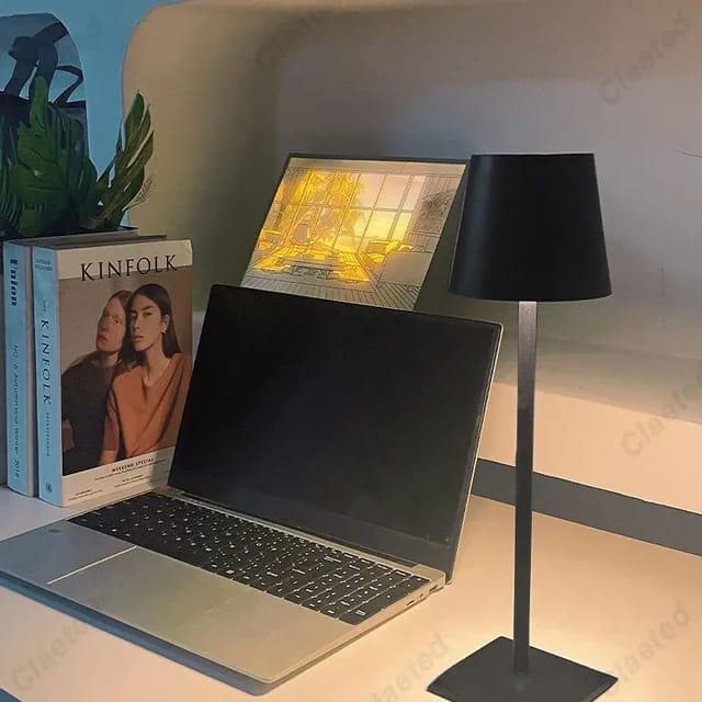 USB Cordless LED Table Lamp Is Placed Near Laptop.