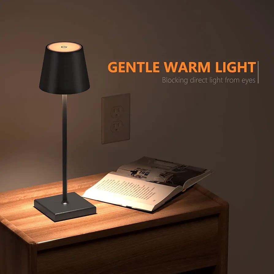 USB Cordless LED Table Lamp Is Placed On a Table.