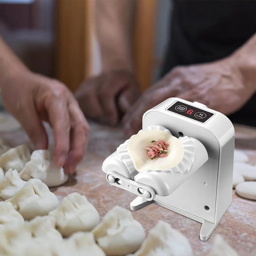 Someone making dumplings with the help of a USB Rechargeable Electric Dumpling Machine