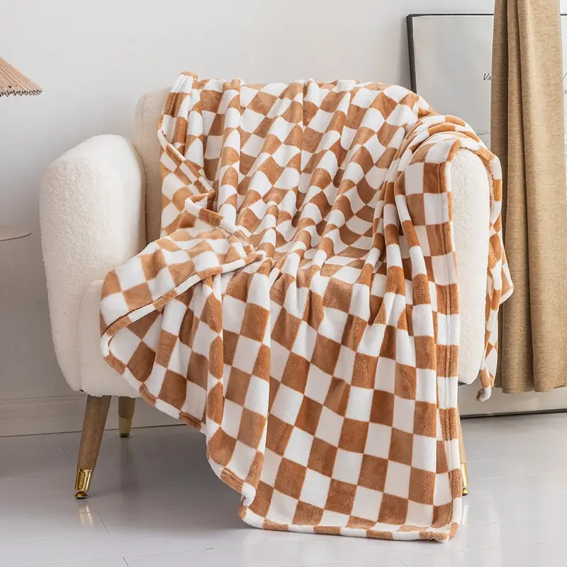 Ultra Soft Flannel Fleece Blanket is Kept On a Chair.