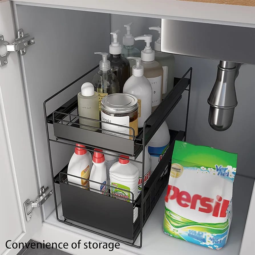 Black and white Under Sink Storage Rack with food and drinks neatly placed in the cupboard