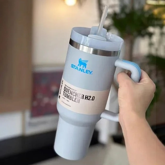 someone holding Vacuum Insulated Tumbler with Lid and Straw
