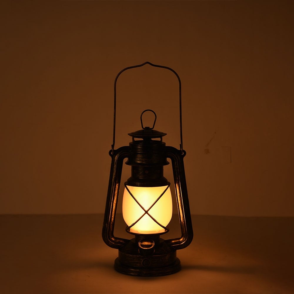 Vintage-style lantern with a warm glow on a dark background