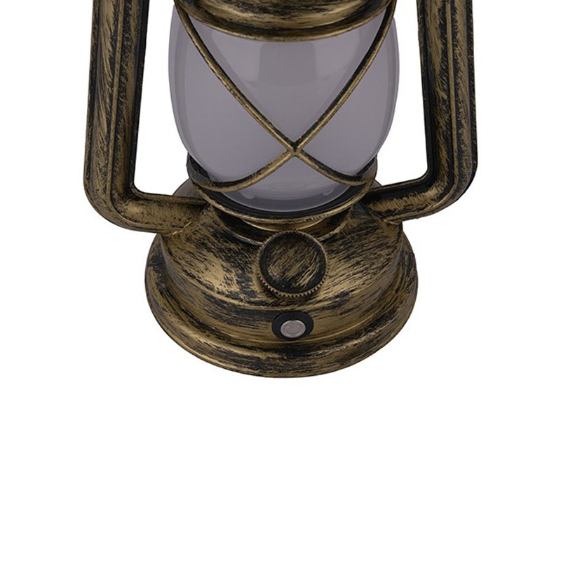 Vintage-style lantern with brass finish on a white background