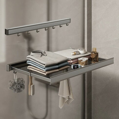 Cloths and other Items are Arranged in a Wall-Mounted Foldable Drying Rack.