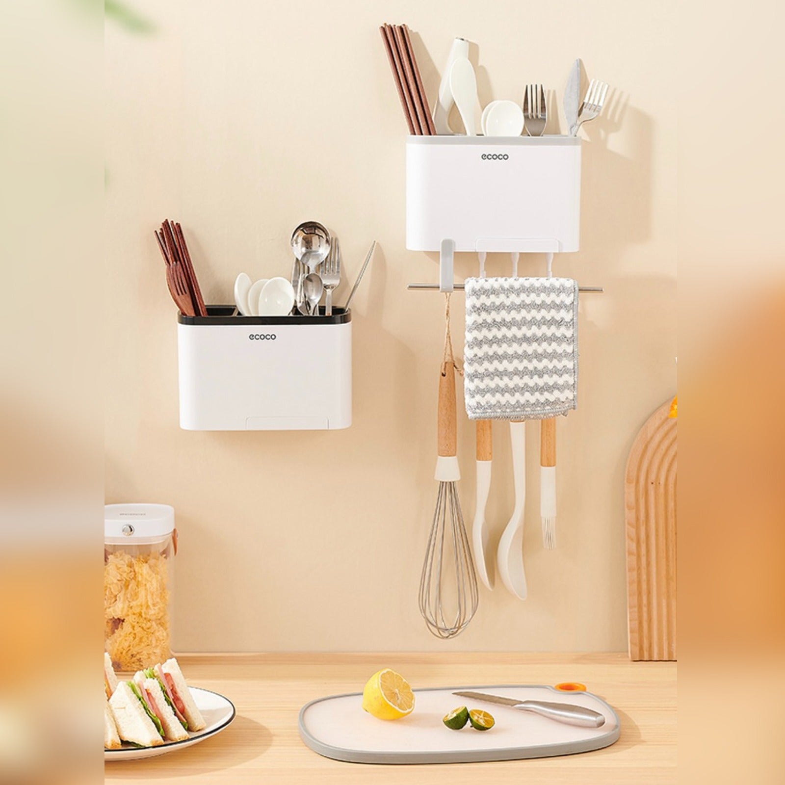 Ecoco Utensil Storage Rack placed on the wall with some items in it