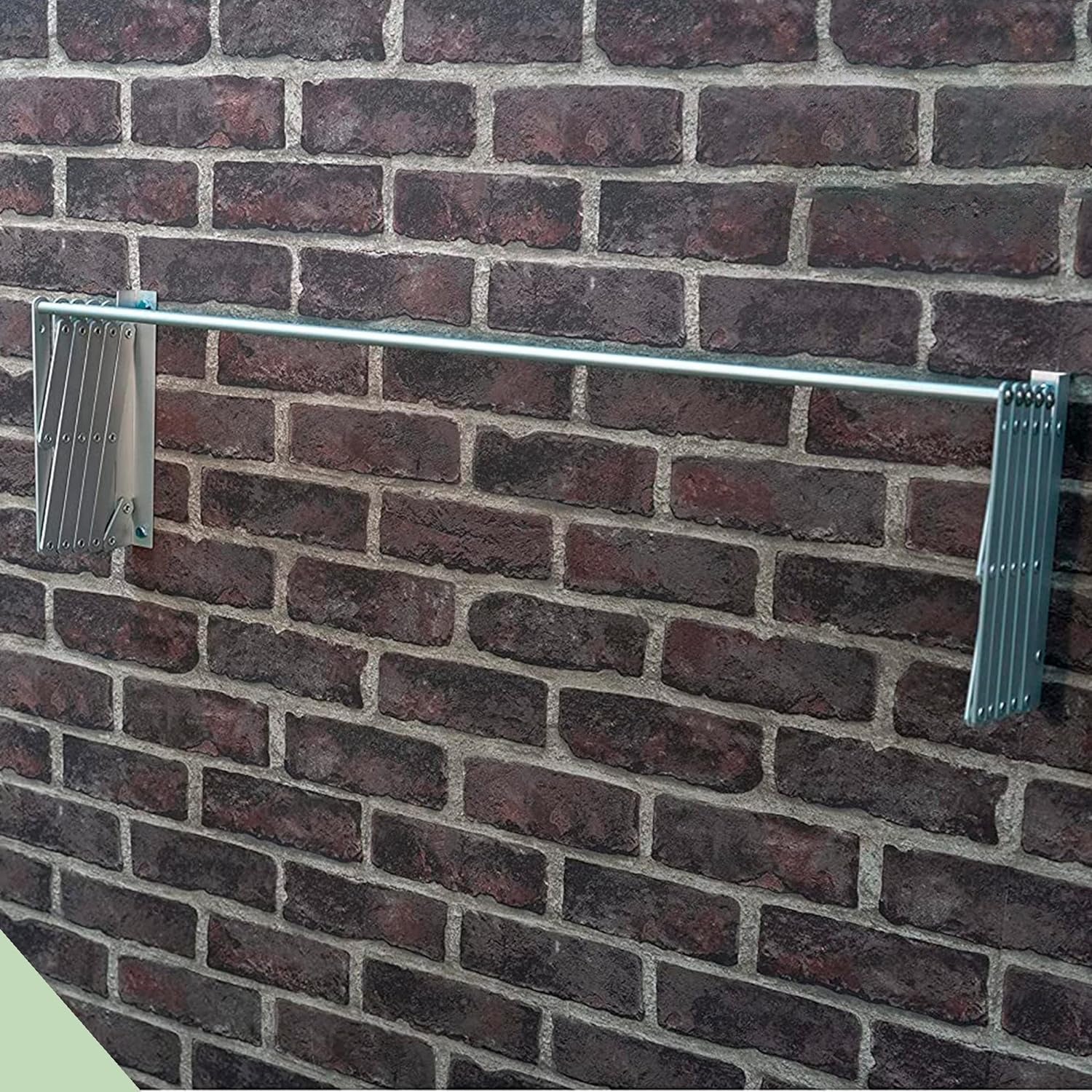  Wall-mounted extendable clothes hanger on the wall