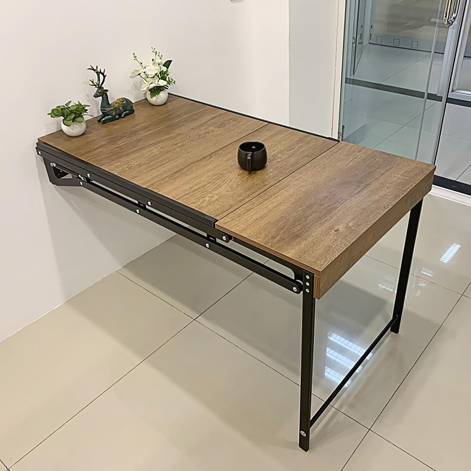 A Wall Mounted Folding Table is Attached to the Wall.