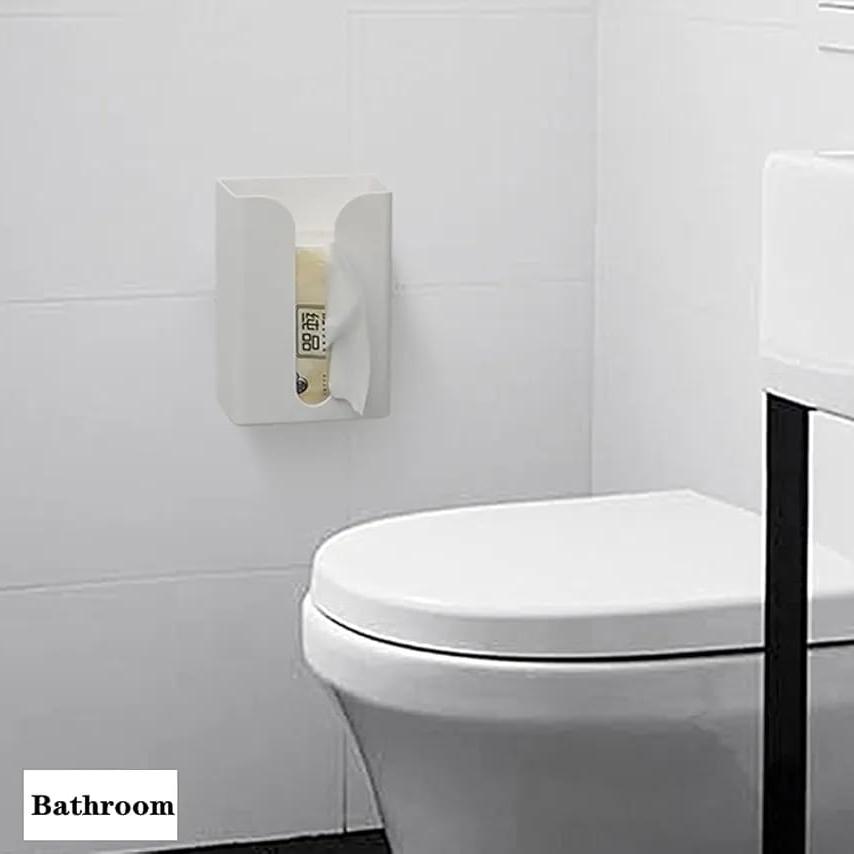 A Wall Mounted Tissue Box Holder Dispenser Rack Is Placed At Bathroom.