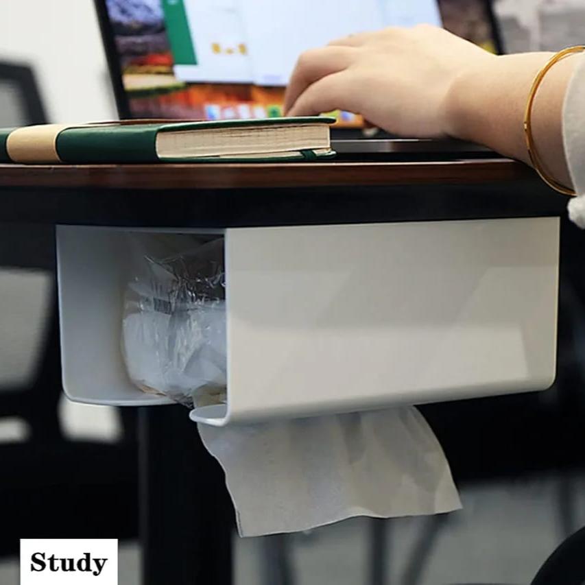 A Wall Mounted Tissue Box Holder Dispenser Rack is Attached On teh Desk.