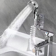 Wash Basin Handheld Shower with water flowing into a bathtub