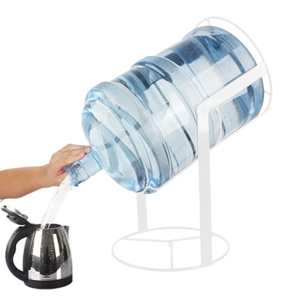 A Person is Taking Water From Conainer Placed in a Water Container Stand.