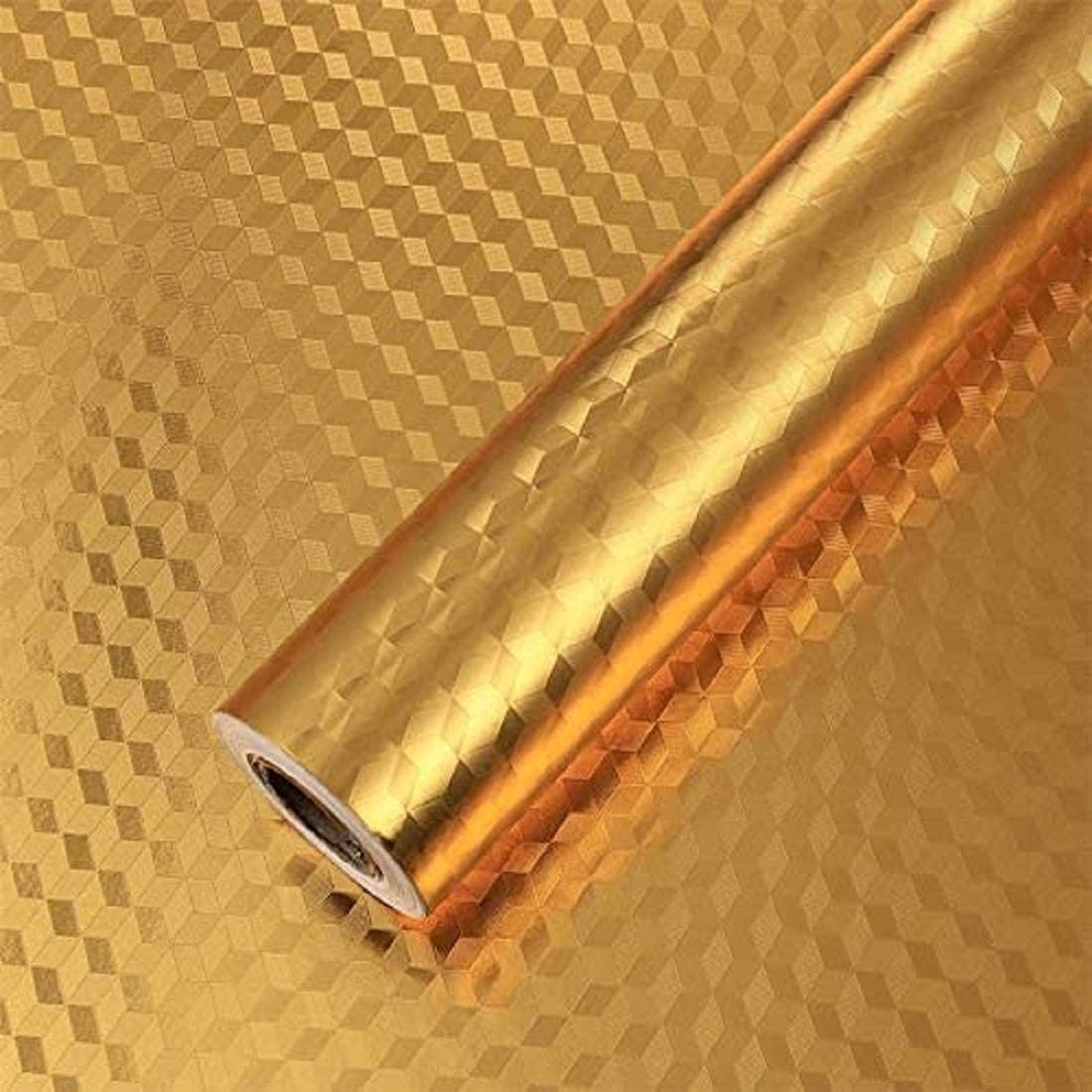 Roll of gold reflective material on a textured gold background