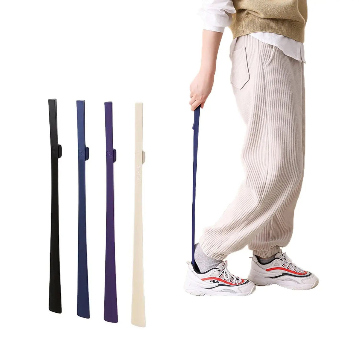 A Person is Wearing Shoe Using Long Handle Shoe Horn.