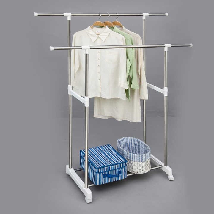 A Double Rods Clothes Drying Stand displaying various garments hanging neatly on a clothes rack.