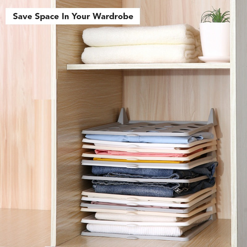 cloths organized in a shelf using with help of Wardrobe Clothes Stacking Organizer