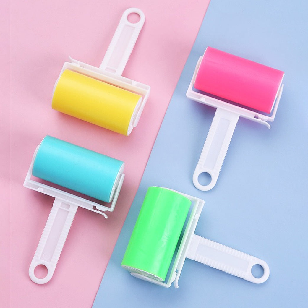 Reusable Lint Remover in Yellow,Blue,Green and Pink color kept on a blue-pink color surface