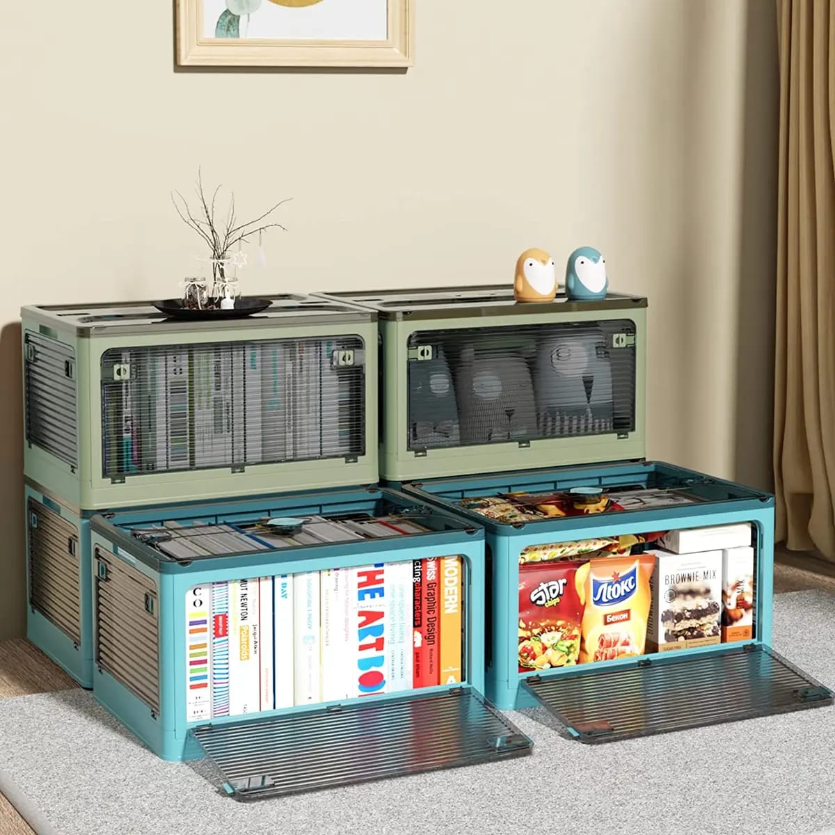 4 Foldable Transparent Storage Box with Wheels 2 in green and 2 in blue color placed in a room