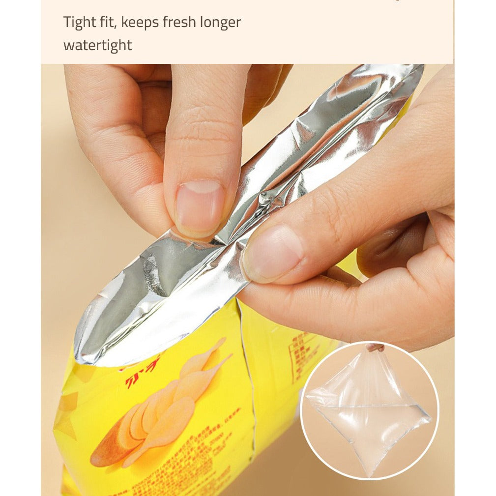 A person trying to open a bag sealed using Snack Bag Sealer Machine 