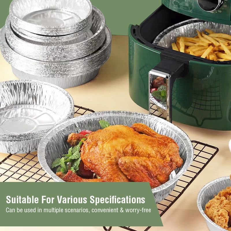 Chicken served in an Aluminum Foil Plate and kept next to an air fryer 