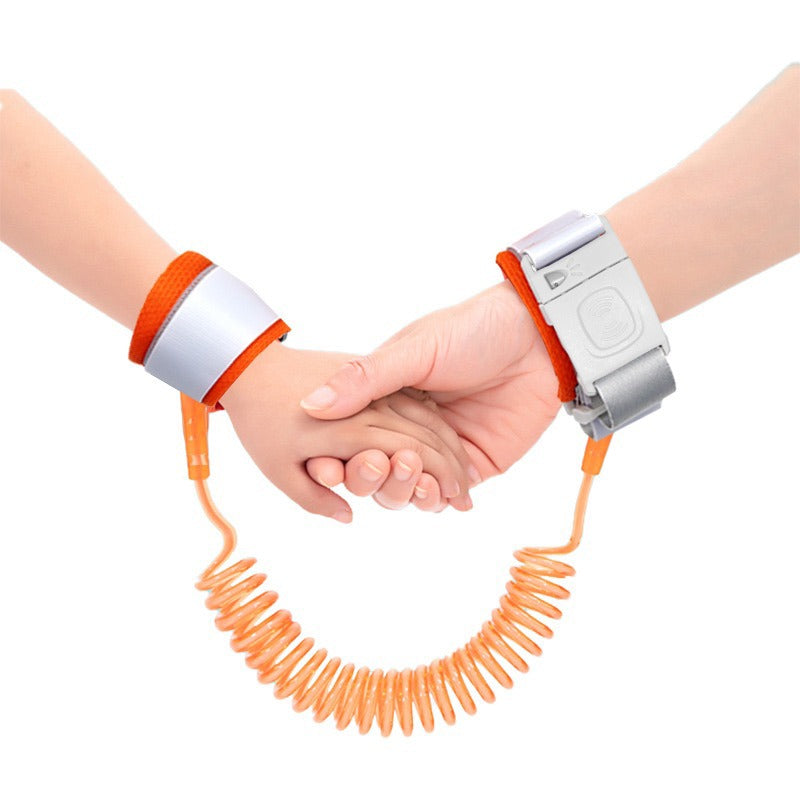 Hands tied with Orange Child Safety Harness Leash holding each other
