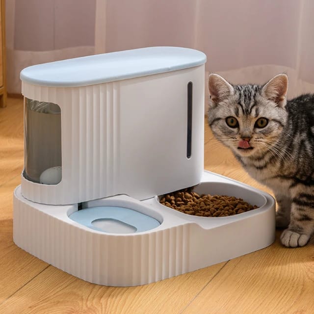 Automatic Pet Feeder & Water Dispenser placed beside to a cat on a wooden floor