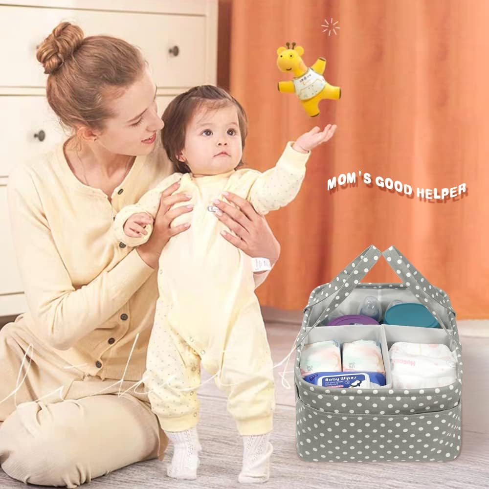 Baby Diaper Caddy Bag kept on a floor next to a mother and a child