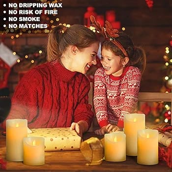 5 Flameless LED Candles lit up and placed in front of a woman and a girl sitting together  